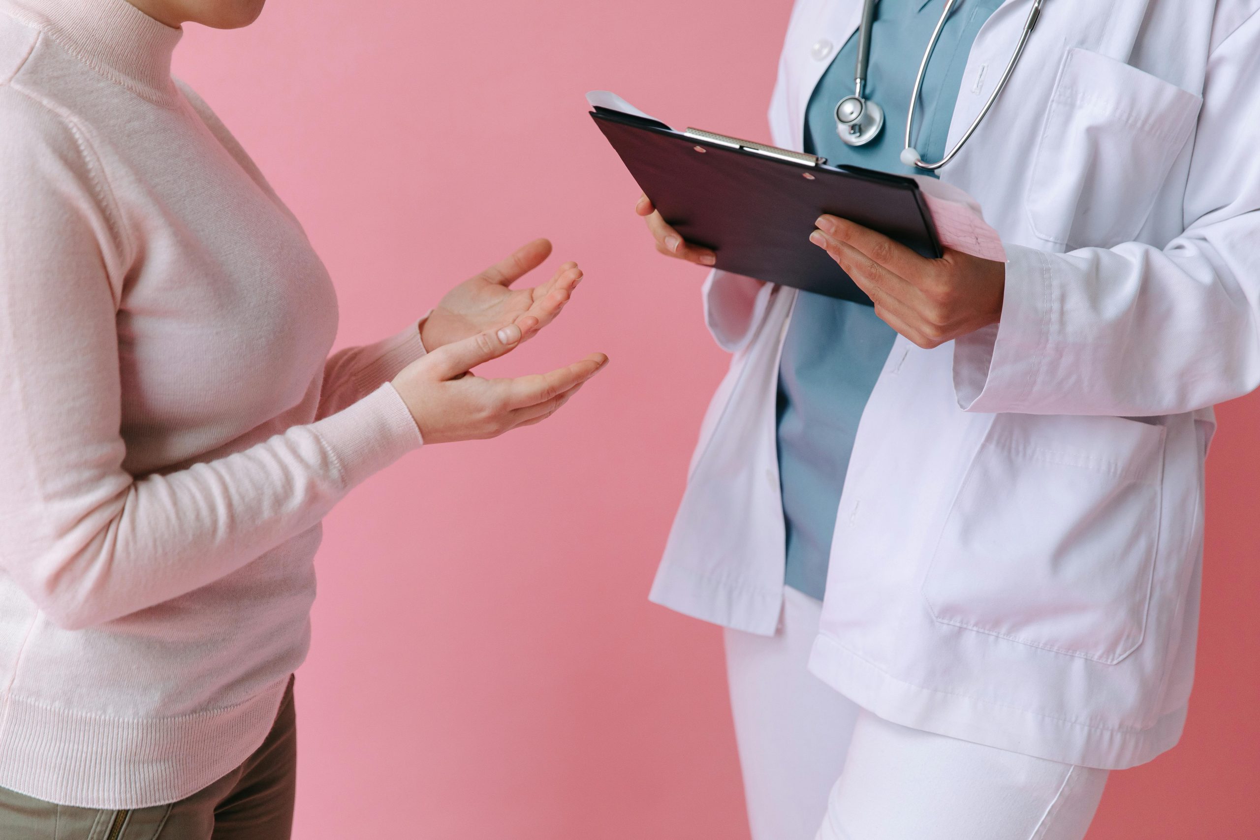 Doctor consulting a Patient Doctor consulting a Patient
